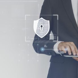 Businessman logging in to his tablet